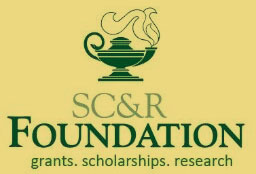 SCR Foundation logo on gold